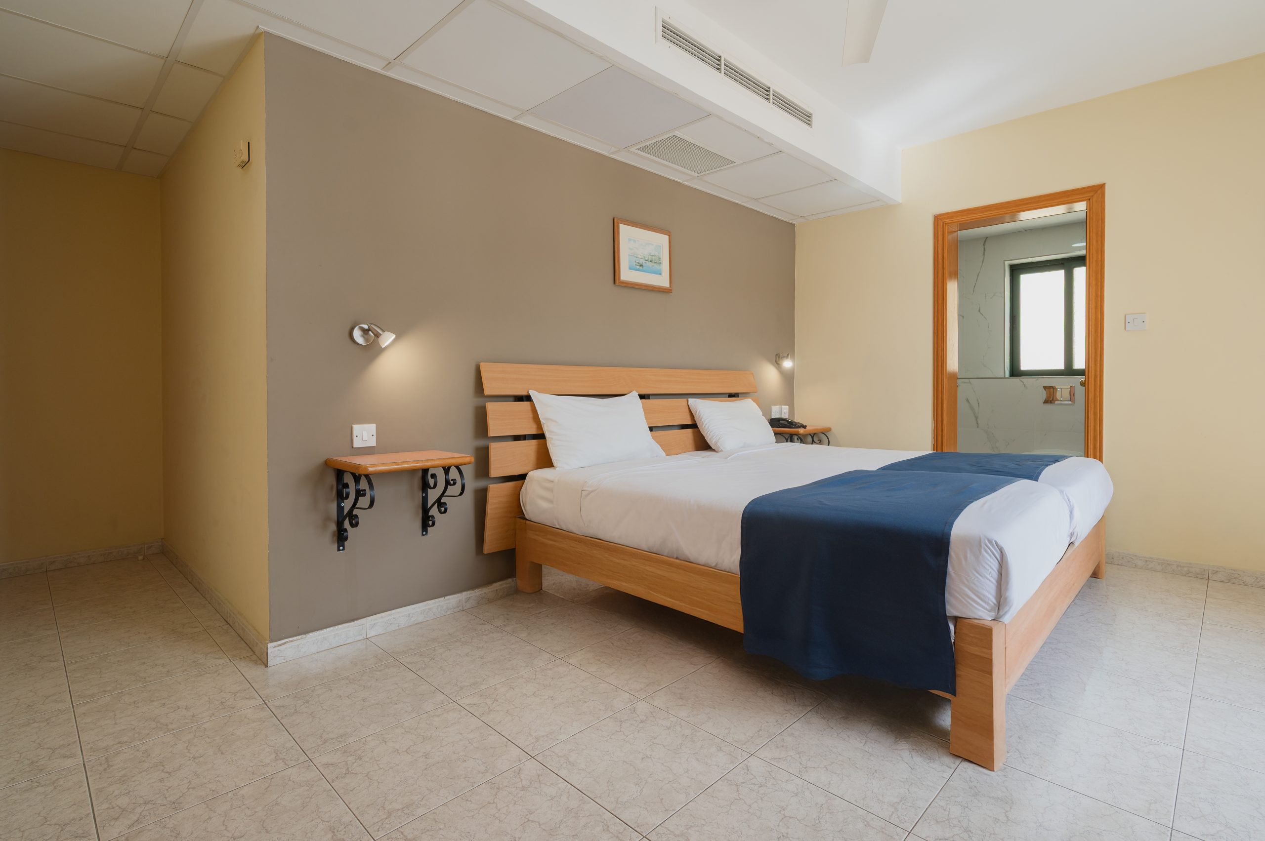 Triple Room with three single beds at Xemxija Bay Hotel